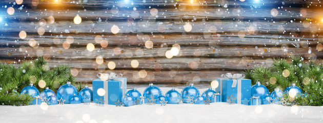 Blue christmas baubles and gifts lined up 3D rendering