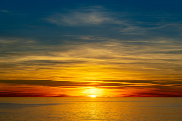 Obraz na płótnie Canvas Colorful sunset above the sea. Summer vacation concept