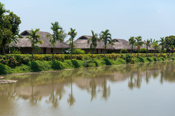 Fototapeta na wymiar Bungalows by the Mekong River