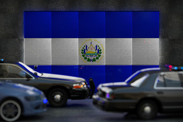Bright digital display El Salvador flag in city as cars drive past