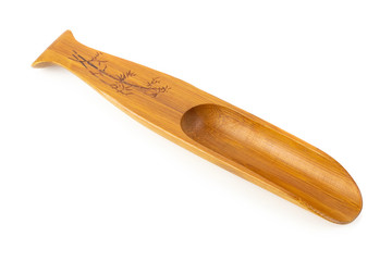 Wooden spoon isolated on a white background
