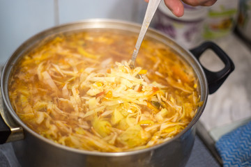 Ukrainian hot borscht in a pan