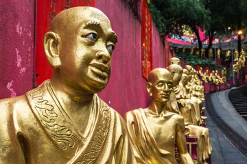 Close up of a golden Buddha statue at Ten Thousand Buddhas Monastery(Man Fat Tsz), Hong Kong, Sha Tin, New Territories