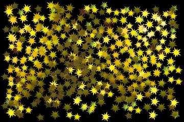 étoiles dorées sur fond noir 