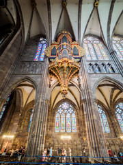 Fototapeta na wymiar Strasbourg, France - Aug 18, 2018: Inside the Strasbourg Cathedral or the Cathedral of Our Lady of Strasbourg, Notre-Dame, also known as Strasbourg Minster, Alsace, France, wide angle