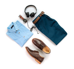 Men's casual outfits for man clothing set with brown shoes , watch, belt, trousers, shirt and earphone isolated on white background, Top view