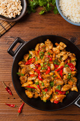 Chicken kung pao. Fried chicken pieces with peanuts and peppers.