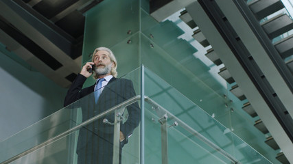 caucasian businessman talking on mobile phone