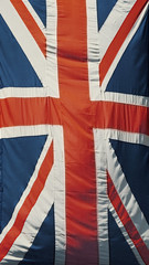 British flag or Union Jack. A vertically hanging flag representing the United Kingdom - 230773455