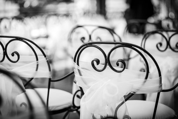 Vintage styled chairs with a white decoration for a special event