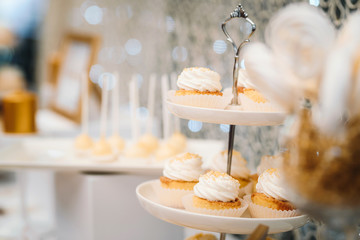 Sweet cupcake desserts with white cream