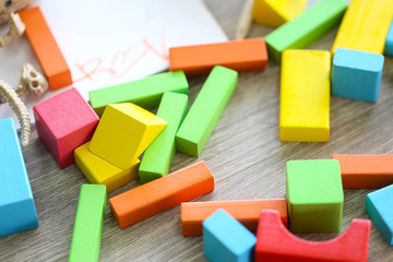 Parent and little child having fun playing educational toys,Family concept.