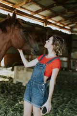 Fototapeta na wymiar Portrait of a girl and a horse