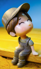 toy dolls figurines boy girl love autumn autumn close-up leaves composition abstraction city...