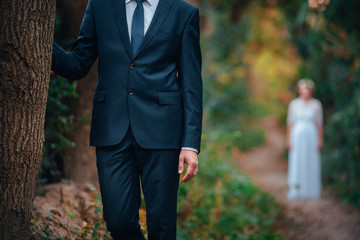 Groom waiting for bride - concept photo