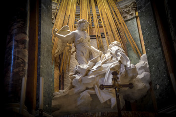 Rome Italy. Famous sculpture by Bernini, ecstasy of St Teresa in the church of St Maria della Vittoria - obrazy, fototapety, plakaty