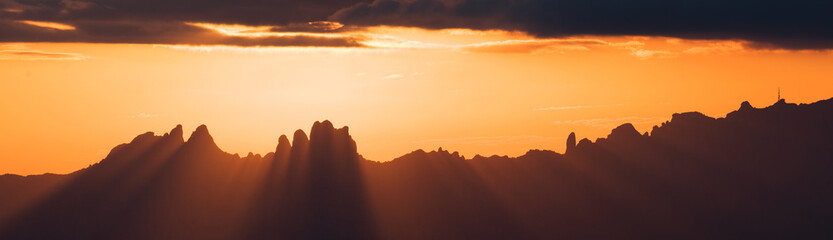 Amazing sunset panorama over Montserrat as seen from Sant Llorenc del Munt - obrazy, fototapety, plakaty