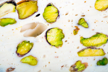 Turkish nougat with pistachio background