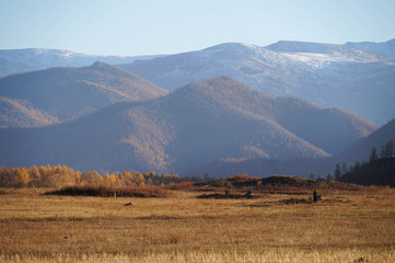 Ancient burial mounds at Karakol valley (Uch-Enmek park) in Altai Republic,Russia.