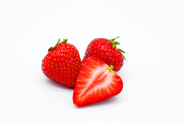 Strawberries cut isolated on white background, piece of strawberry