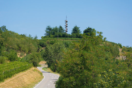 The landscape near Smartno in Primorska, Slovenia,  showing the Gonjace Observation Tower on Mejnik Hill in the distance
