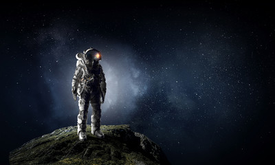 Fototapeta na wymiar Astronaut and his mission. Mixed media