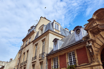 Fototapeta premium Roofs of old historical buildings in Paris