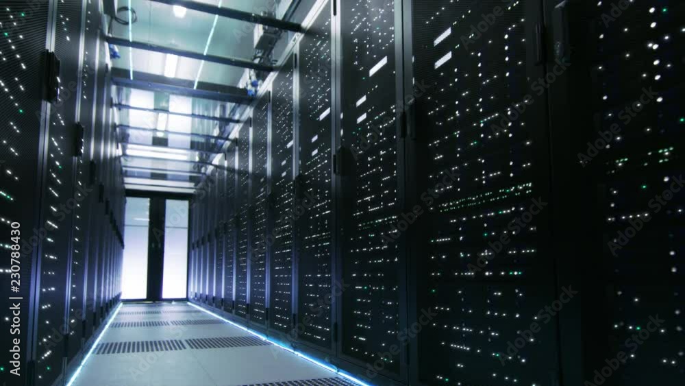 Aufkleber looped cinemagraph: working and active data center with server racks full of blinking led lights.