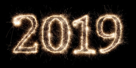 bright sparkler pyrotechnic fireworks number 2019 happy new year sylvester concept isolated on black background