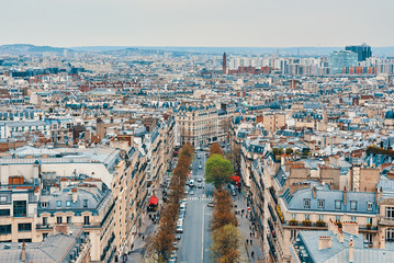 Obraz premium PARIS, FRANCE -APRIL 9, 2018: View from the Arc de Triomphe to the city