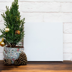 Mock up poster.  White empty canvas and brick wall. Christmas concept.