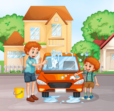 Father and boy washing car