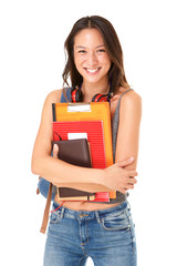 smiling asian female student with books standing against isolated white background