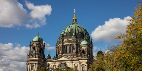 Fototapeta na wymiar Berlin Cathedral, Dome Berliner, Berlin Germany, against blue sky
