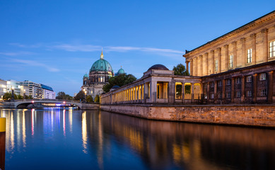 Fototapeta na wymiar Bode museum illuminated, Spree river, museum island, Berlin, in the evening.