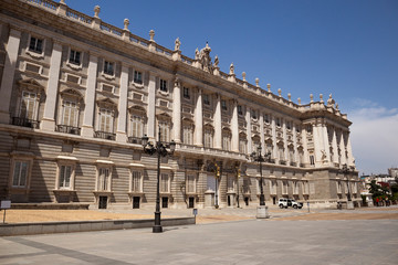 Fototapeta na wymiar Majestic, beautiful Royal Palace of Madrid (Palacio Real de Madrid) in the center of the city in the sun rays