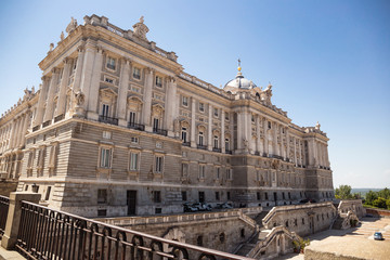 Fototapeta na wymiar Majestic, beautiful Royal Palace of Madrid (Palacio Real de Madrid) in the center of the city in the sun rays