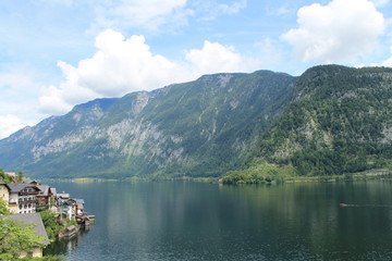 Fototapeta na wymiar Alpine mountain lake on the background of high mountains