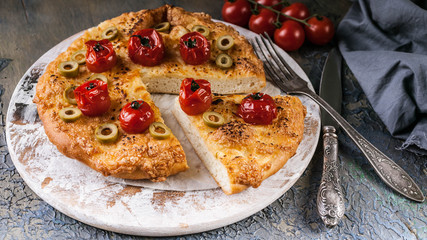 Delicious pizza four cheese with cherry tomatoes