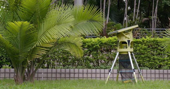 Solar energy mosquito catching machine in park