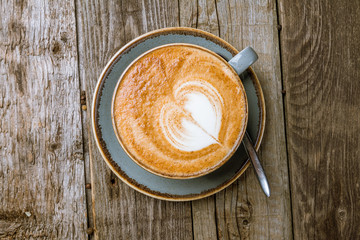 Cappuccino coffee with heart drawing