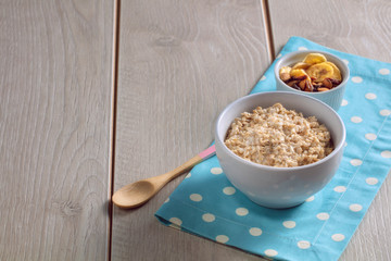 Breakfast of oatmeal with strawberries.