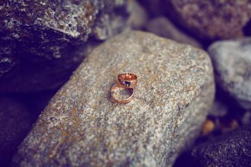 wedding rings on the stone