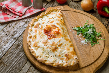 Closed calzone pizza
