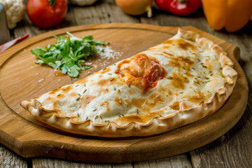 Closed calzone pizza