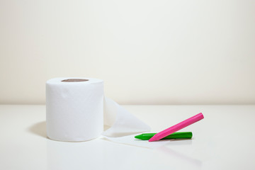 Roll of toilet paper and drawing pastels