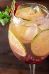 glass of delicious alcoholic cocktail on dark background