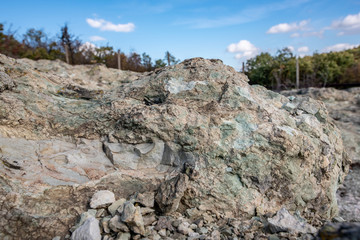 Quarry zeolite raw mineral  and stone wall.
