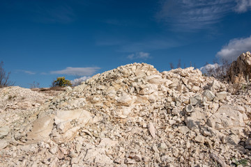 Quarry zeolite raw mineral  and stone wall.
