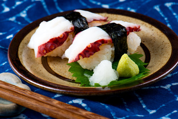 Sushi tako Japanese octopus slice.